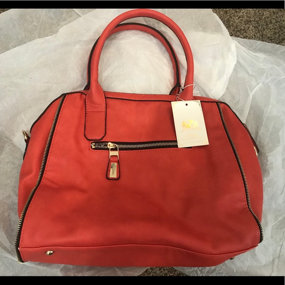 Large purse/tote. Can function as a crossbody.